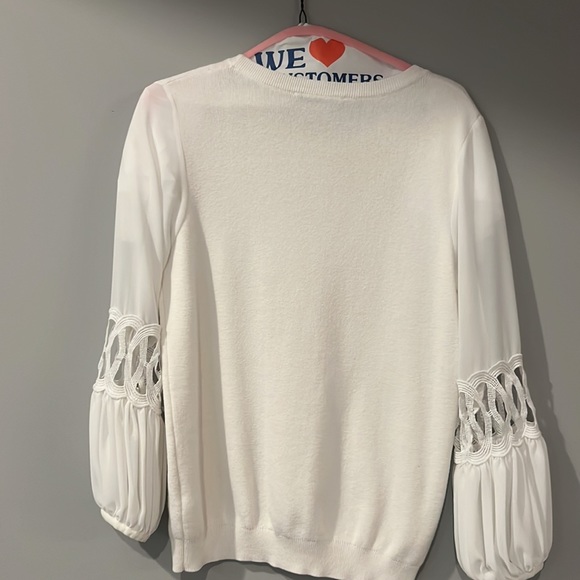 Beautiful white sweater with embellished long sleeves. Good condition. - Picture 2 of 4
